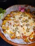 Sweet Enchilada with Ground Beef on a Bed of Potatoes