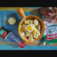 A picture of Potatoes salad with dressing.