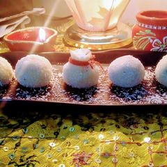 Coconut laddu made from milk and desiccated coconut Powder A picture of Coconut laddu made from milk and desiccated coconut Powder.
