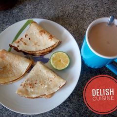 A picture of Pancakes and tea!.