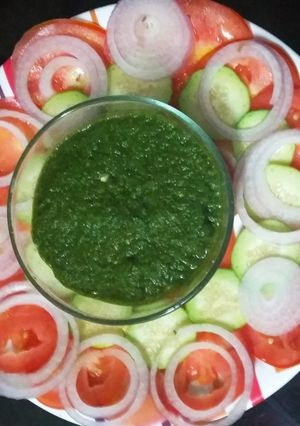 A picture of Green Chutney with Salad.
