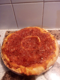Una foto de Pizza rellena🍕