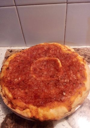Una foto de Pizza rellena🍕