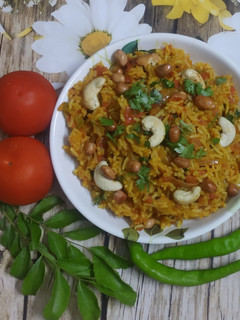 ટોમેટો રાઈસ (Tomato Rice Recipe In Gujarati) રેસીપી મુખ્ય ફોટો
