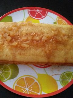 Una foto de Bizcocho de mandarina con sirop de piña y canela