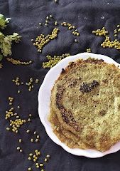 A picture of Green moong dal cheela.