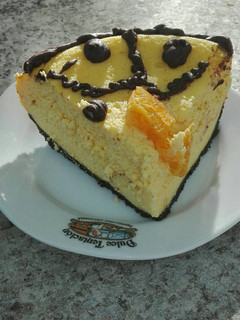 Una foto de Tarta de queso y naranja en la olla GM g