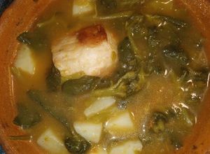 Una foto de Guisado de carne de puerco con verdolagas y papas