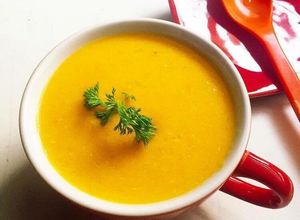 Hình của món Cháo cá hồi bí đỏ.