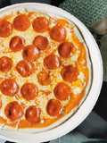Pizza de pepperoni en sartén