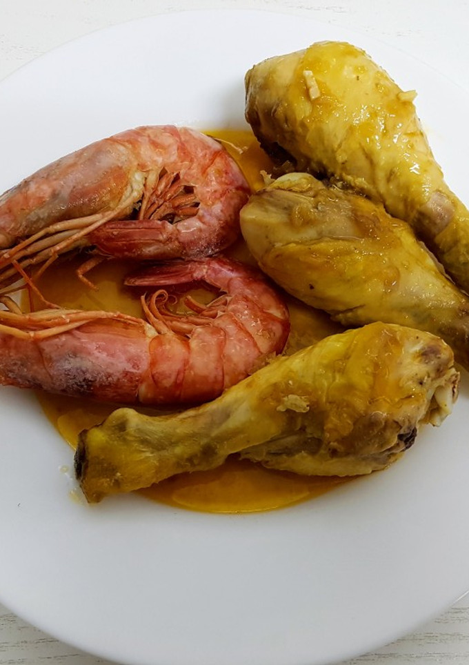 Una foto de Muslitos de pollo con gambas