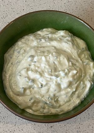 A picture of Tzatziki (yoghurt and cucumber dip).