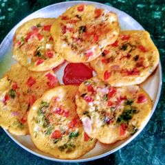 A picture of Tomato Onion Mini Uttapam.