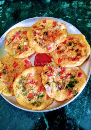 A picture of Tomato Onion Mini Uttapam.
