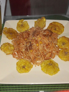 Una foto de Espaguetis al estilo dominicano😎🍽
