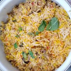 Chicken malai tikka biryani A picture of Chicken malai tikka biryani.