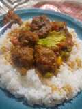 Rice and beef rounds in sauce