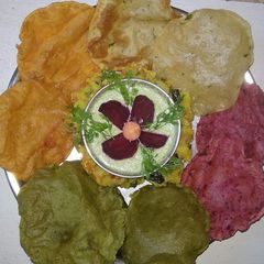 A picture of Colourfull Mix Veg Bhature.