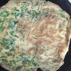 A picture of Omelet with Green onion.