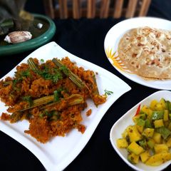A picture of Stuffed drumstick masala.