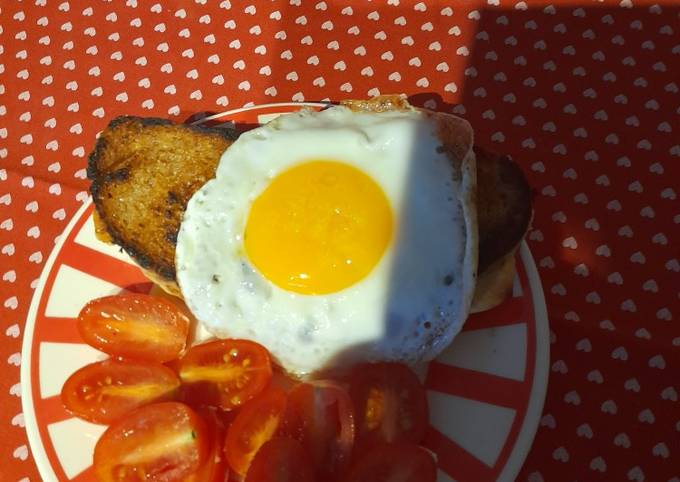 Croque Madam or cheese and ham toast with egg