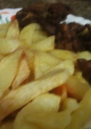 A picture of Fry chips and fry meat.