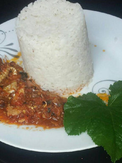 A picture of Fish stew with rice.