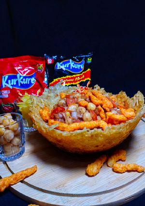 A picture of Kurkure Tezdhaar Chaat In Potato Nest.