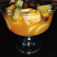 A picture of Fruit Chaat With Orange Juice 🍊 😋.