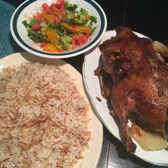 A picture of Copy of Roasted Duck on a bed of carrots.