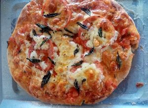 Una foto de Mini pizza Margarita 🧀🍅🍕