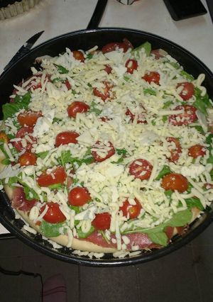 Una foto de Pizza de rúcula deliciosa