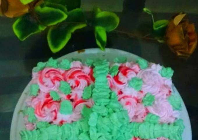 Azaadi roh afza cake with green ribbon and leave(I m not expert)