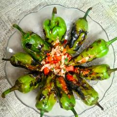 Kathiyawadi Style Roasted Stuffed Mirchi A picture of Kathiyawadi Style Roasted Stuffed Mirchi.