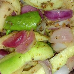 A picture of Raw mango pickle.