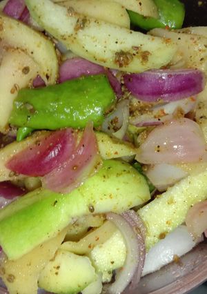 A picture of Raw mango pickle.