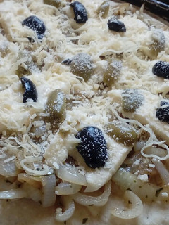 Una foto de Pizza de cebolla