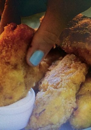 A picture of Crispy Sriracha Buttermilk Oven Fried Chicken.