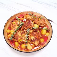 A picture of Basque style chicken (Poulet Basquaise).