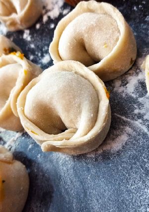 Una foto de Agnolotis de zapallo y muzzarella