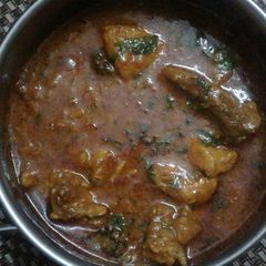 A picture of Butter chicken with gravy.