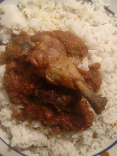 A picture of White rice and stew.