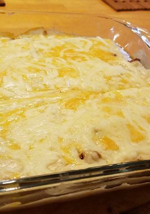 Una foto de Escondidito de yuca (escondidinho de mandioca)