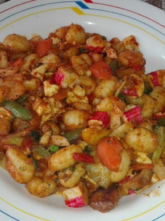 Una foto de Ñoquis con wok asiático