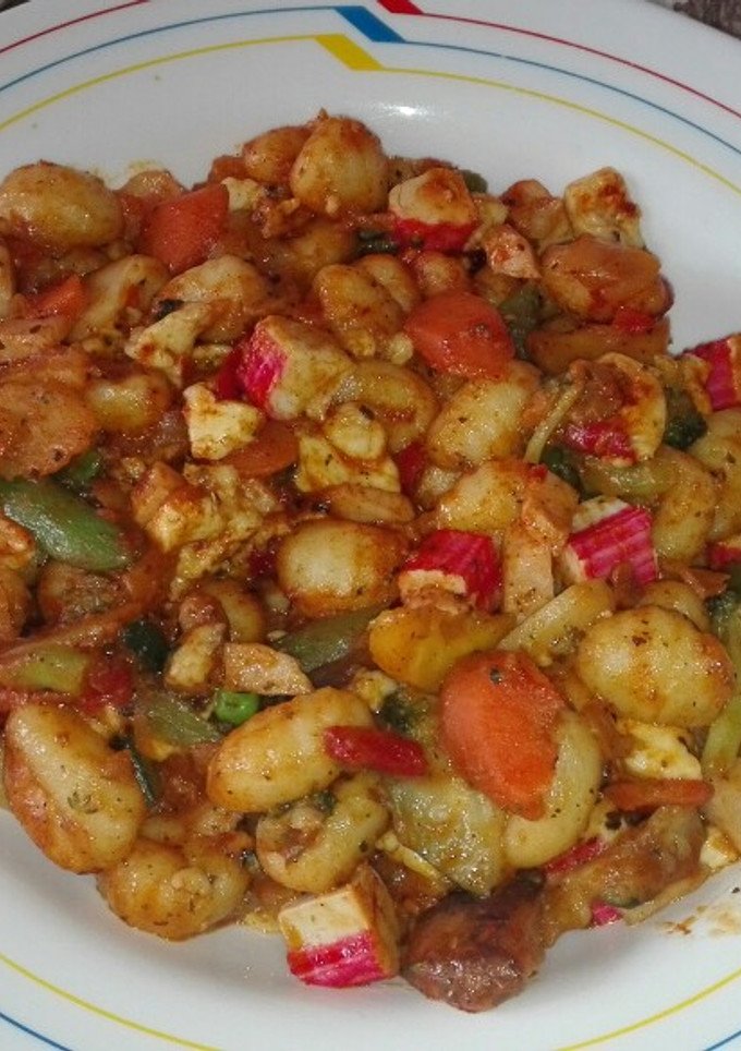 Una foto de Ñoquis con wok asiático