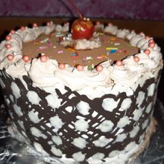 A picture of Polka Dot Chocolate Icing cake.