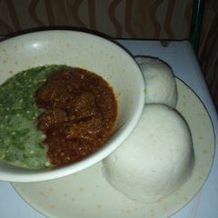 A picture of Tuwon shinkafa and okro soup.