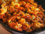 Revuelto de Berenjena asada con Sobrasada, Cebolla caramelizada y Patatas fritas