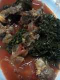 Mutton stew served saute kales