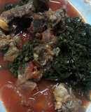Mutton stew served saute kales
